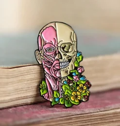 Codex Anatomicus Enamel Pins^Facial muscles and skull with flowers - Enamel pin
