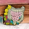 Codex Anatomicus Enamel Pins^Intestines with flowers - Enamel pin