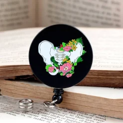 Codex Anatomicus Badge Reels^Pelvic bone badge reel